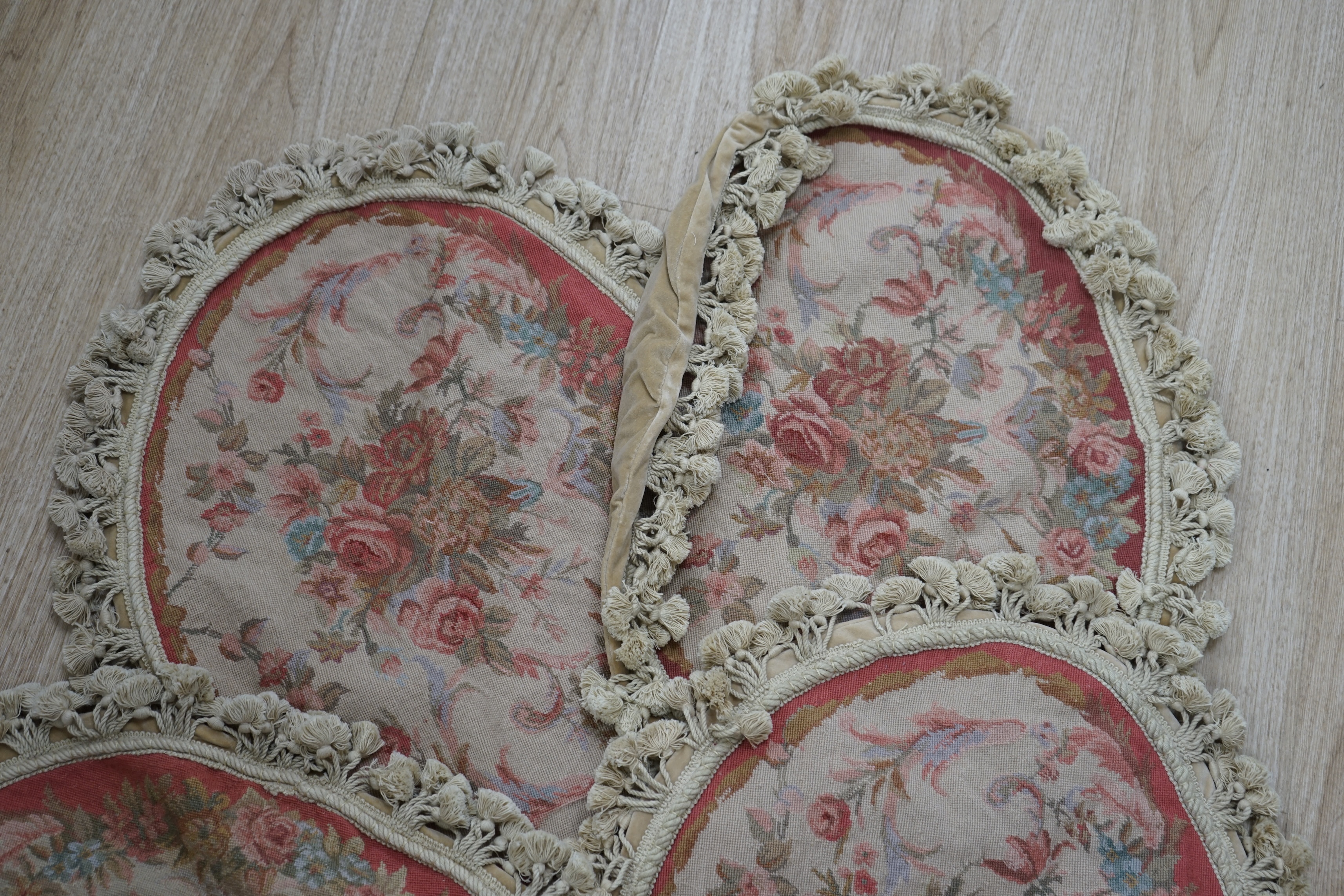Four small fruit design woolwork cushion covers. Condition - fair, wear and fading commensurate with age